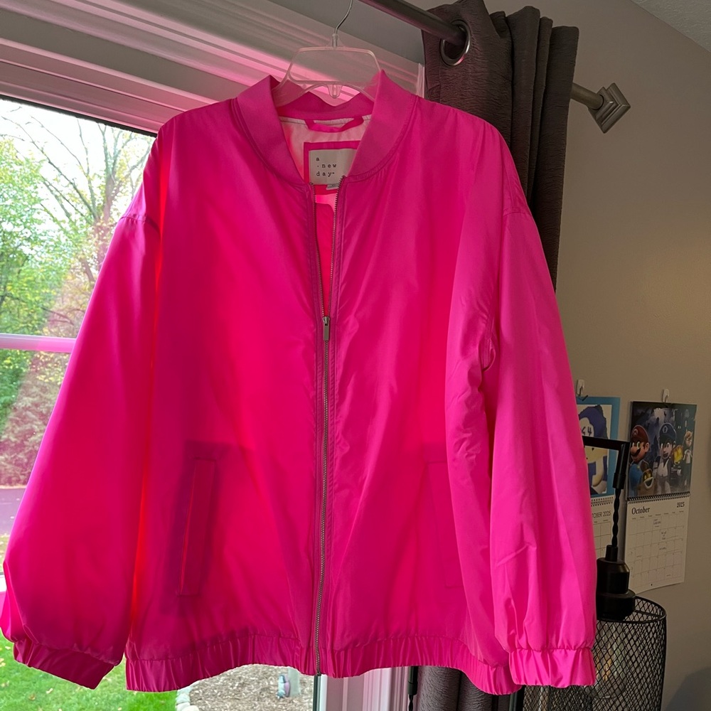 SATIN-Y FINISH, PINK, zip; MEDIUM-weight jacket/windbreaker; “A New Day”, sz XL;